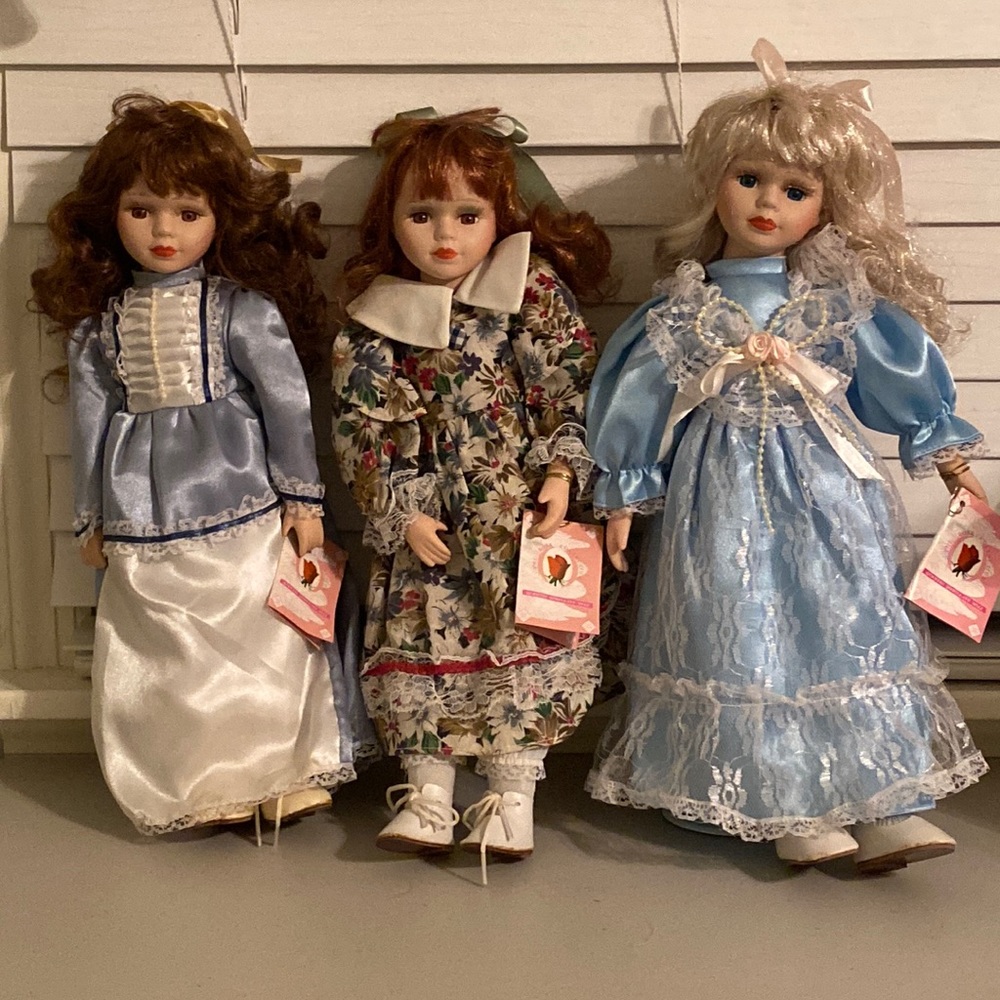 Three Rose Collection porcelain dolls